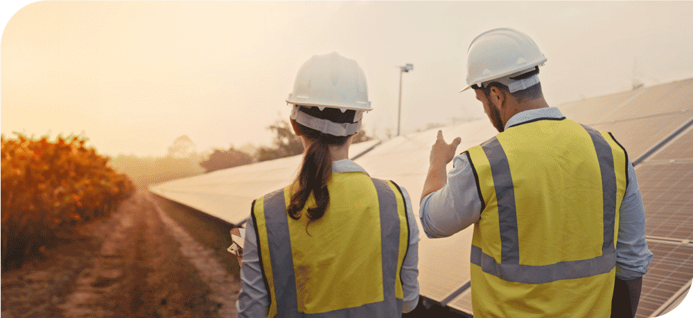 Image of a solar worker speaking with a customer in a solar field